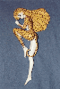 991500 - This model was build from another one, a generic anime-girl lying down. The tail and her mane were added, and she received her spots during the painting afterwards.