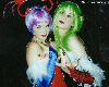 010303 - Lindze cosplaying as Lilith, and Nadine as Morrigan.